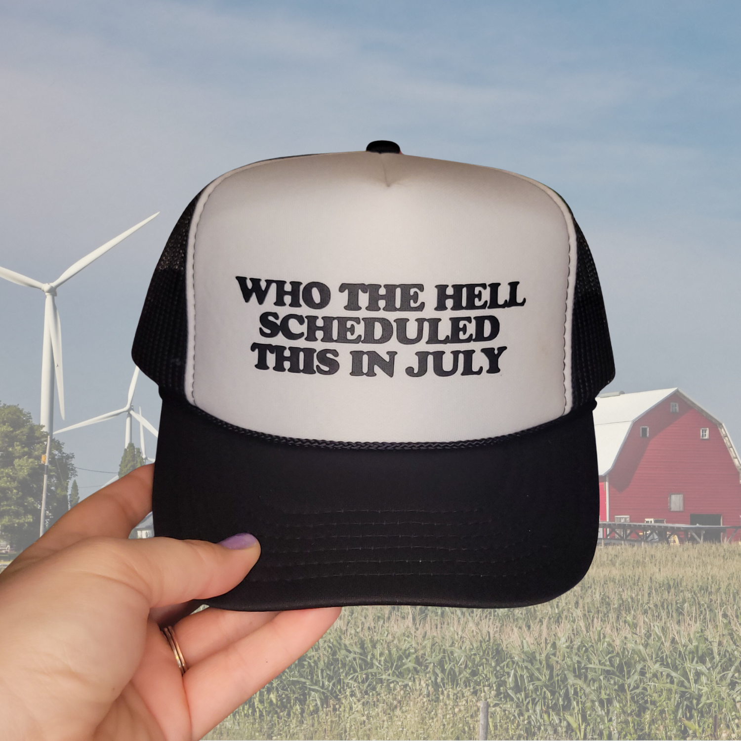 Who the Hell Scheduled This in July Trucker Hat