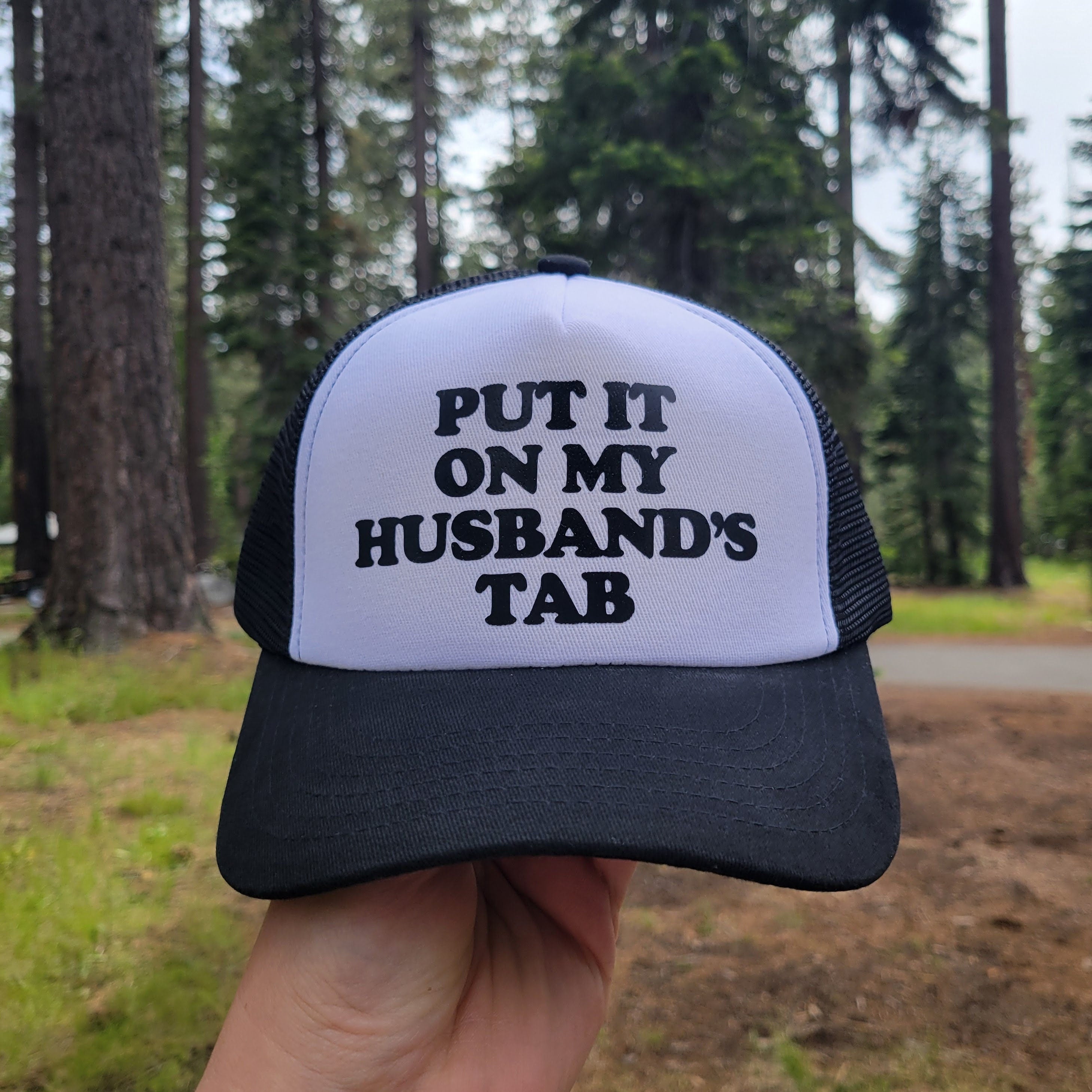 Put it on My Husband's Tab Custom Trucker Hat