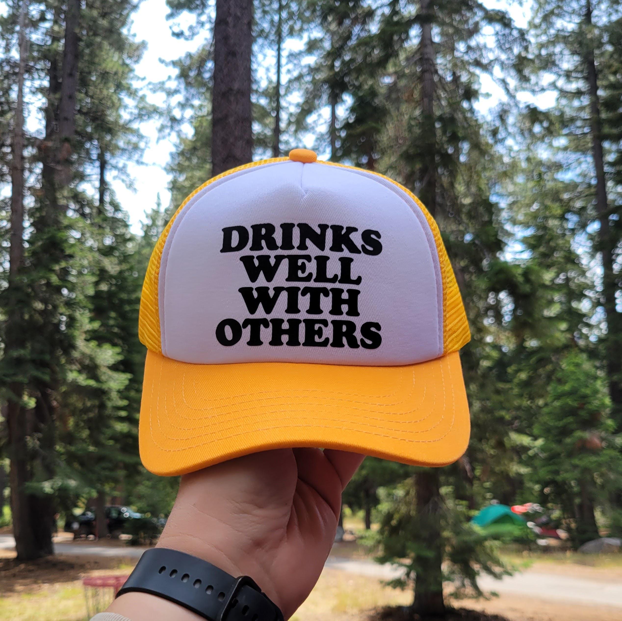 Drinks Well with Others Custom Trucker Hat
